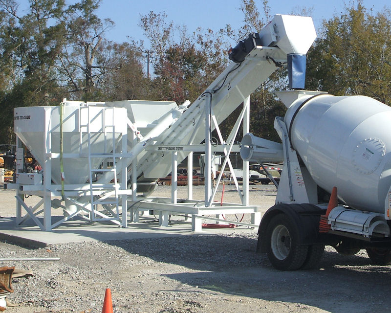 Shortstop 3.5 Loading System with optional CS-125 cement silo and electric motor drive.